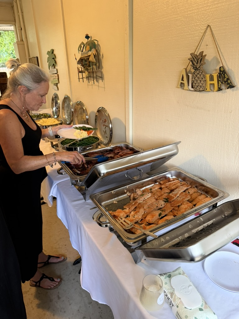 Tray of sliced barbecue ribs on a buffet